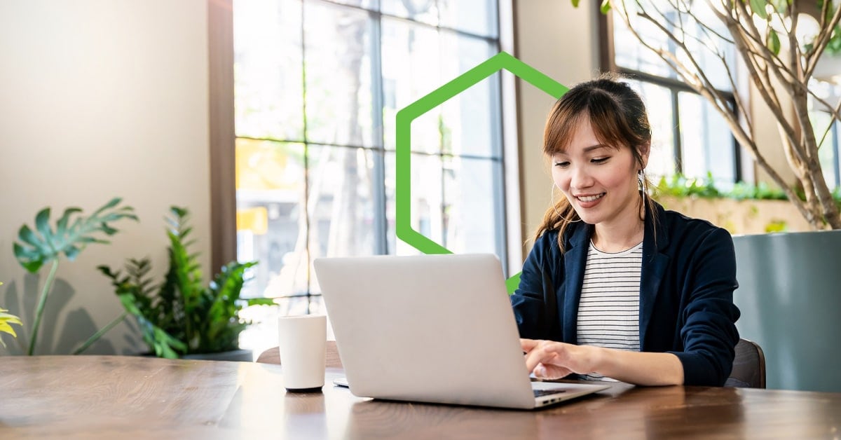 Woman typing on computer