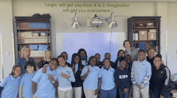 Students who attend financial class pose for picture